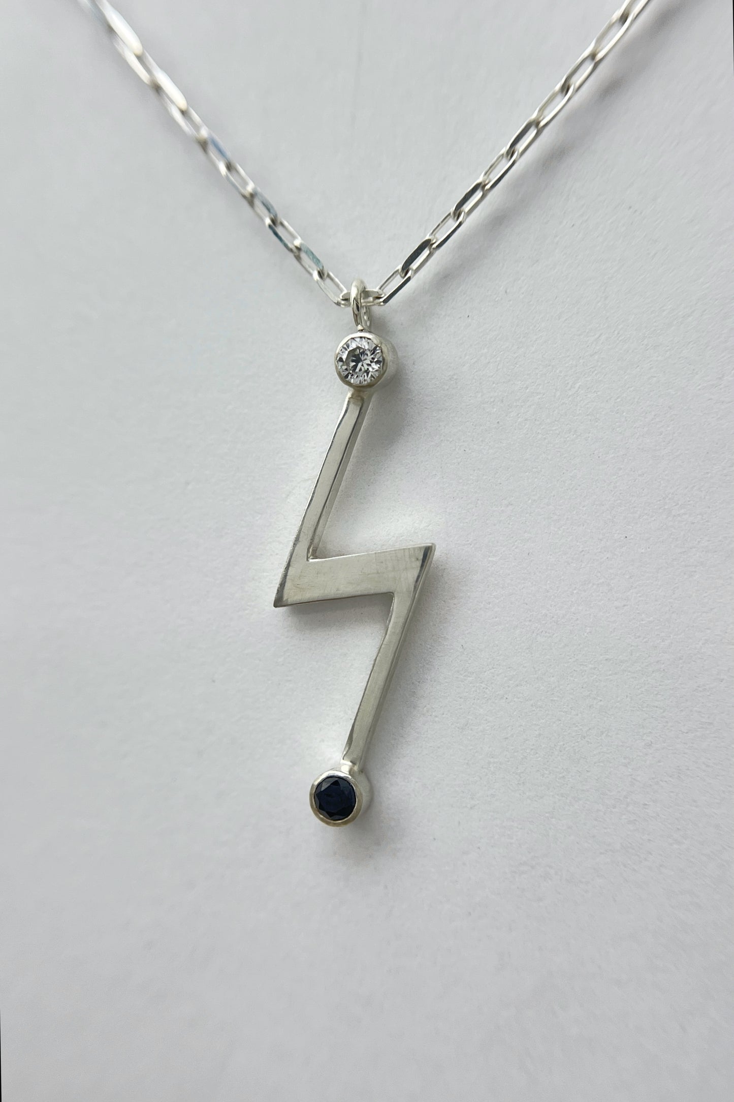 lightning bolt necklace / white cz & black spinel