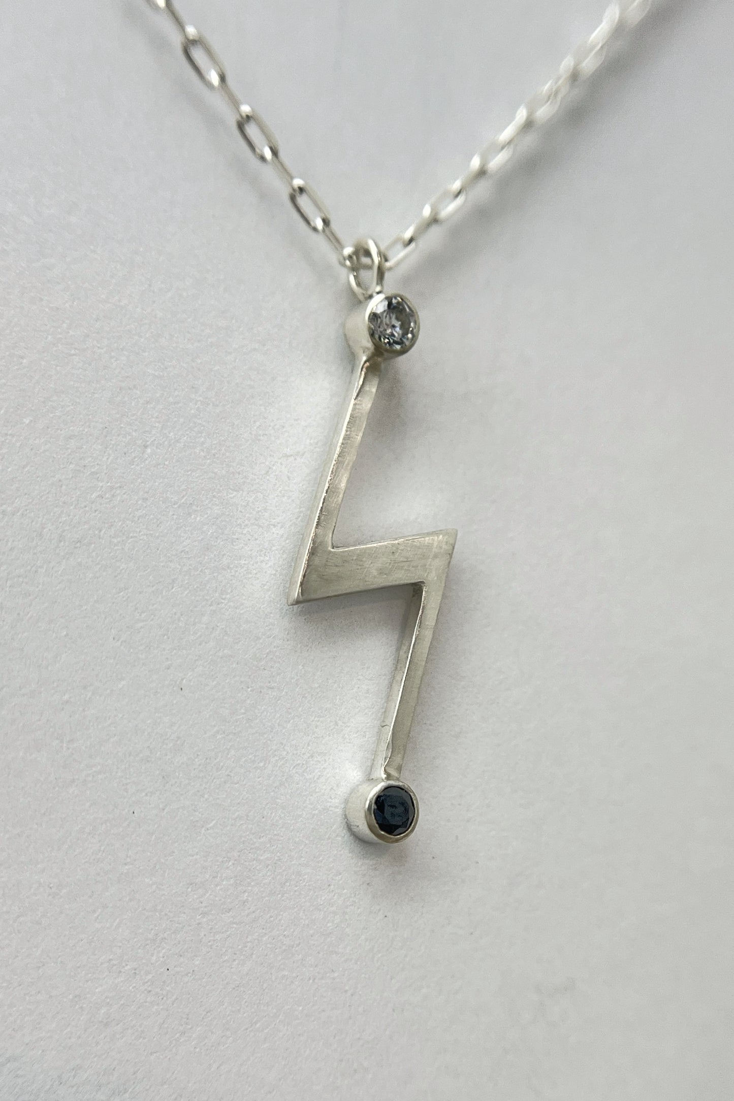 lightning bolt necklace / white cz & black spinel