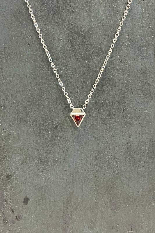 tiny triangle / red cubic zirconia