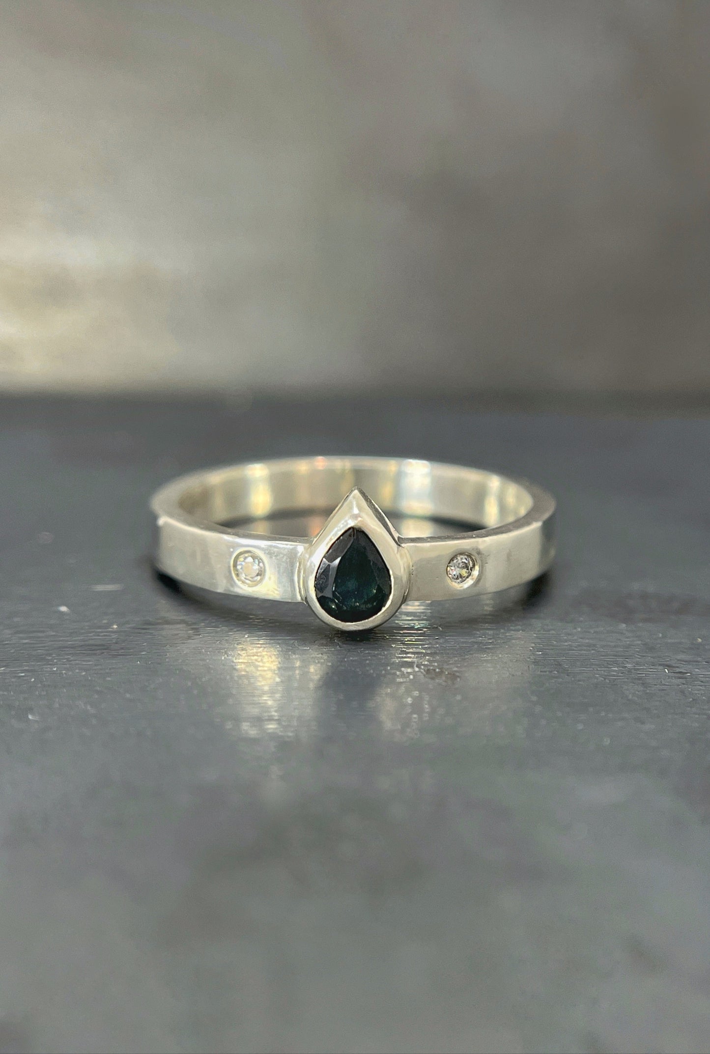 deep blue sapphire pear ring with flush sets / size 9