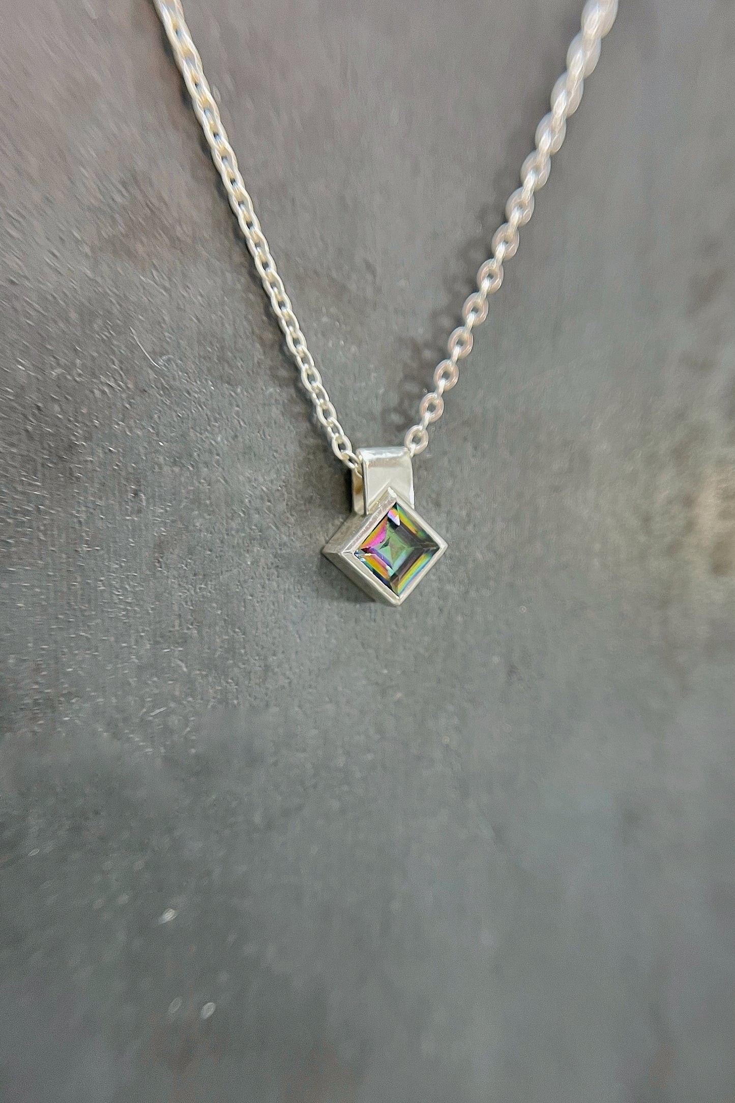 tiny rotated square / mystic topaz