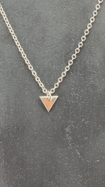 tiny silver triangle charm